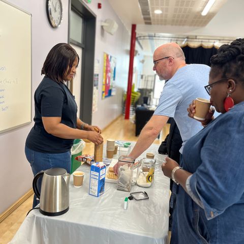 Church members chatting over tea and coffee after a service